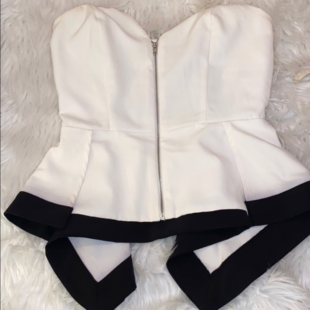Black & white corset style peplum top w cage back